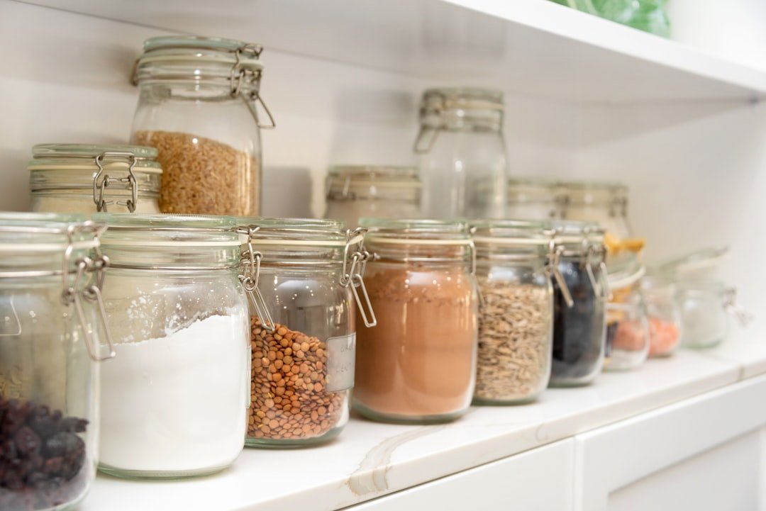 Pantry shelves with jars and staples for dinner when there is nothing in the house